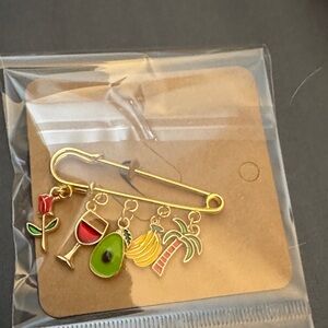 Gold Charm Brooch with Colorful Accents
